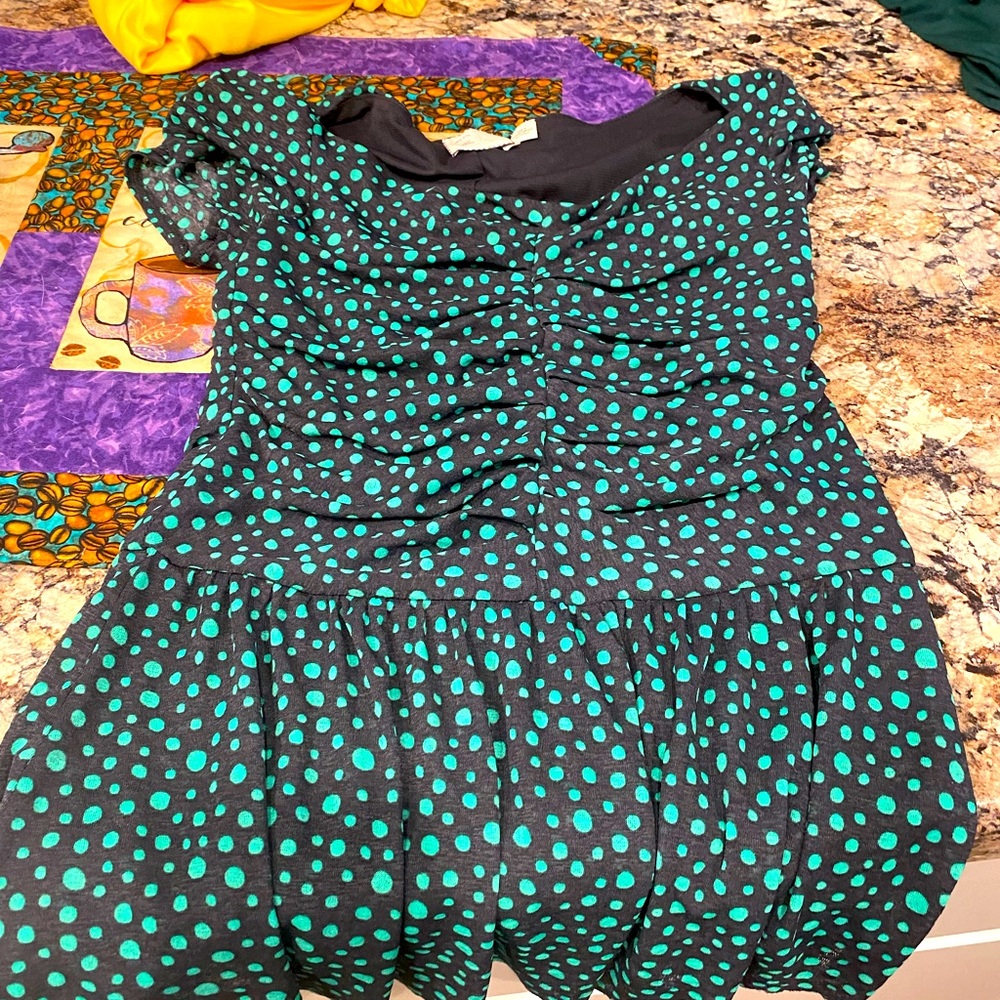 Peplum top. Green. Small.